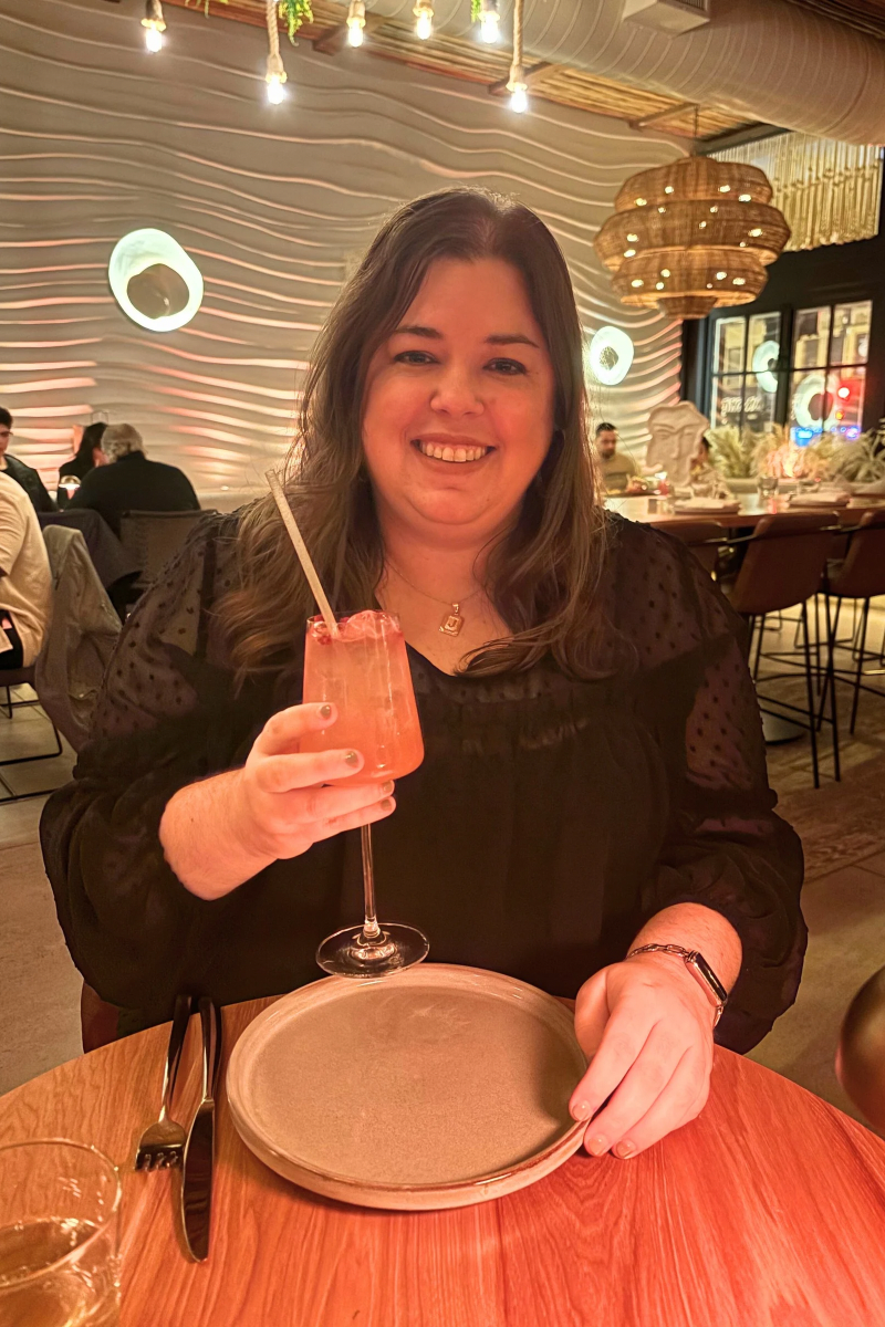 Holding a cocktail while dining during Chicago Restaurant Week